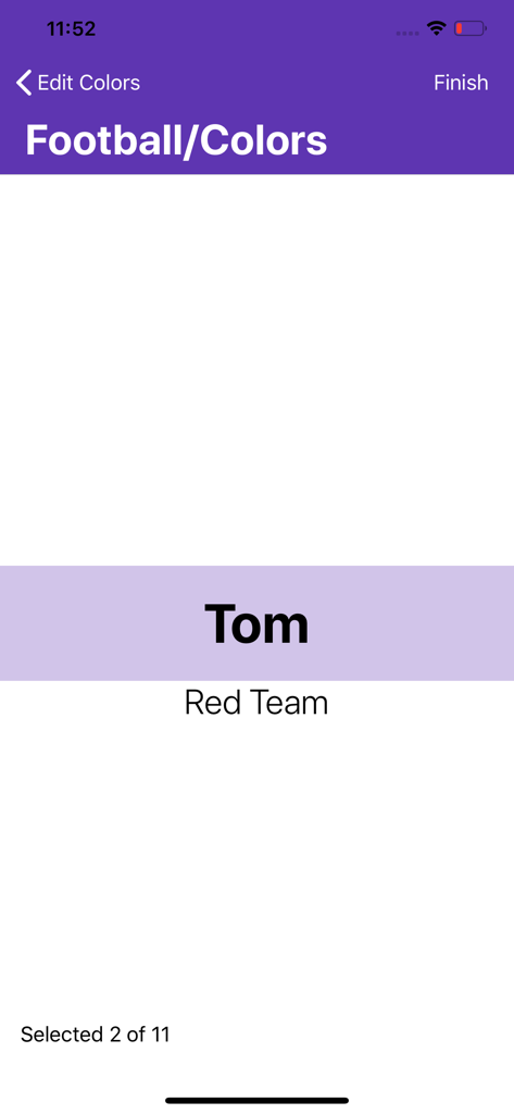 Names in a Hat - A screenshot of the Names in a Hat app showing a name assigned to the Red Team during a random team draw