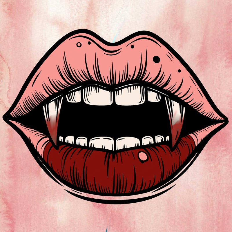 lips with vampire teeth