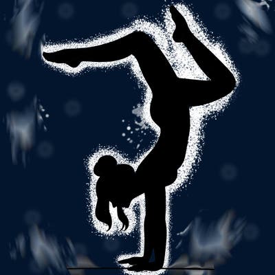 a woman doing a handstand