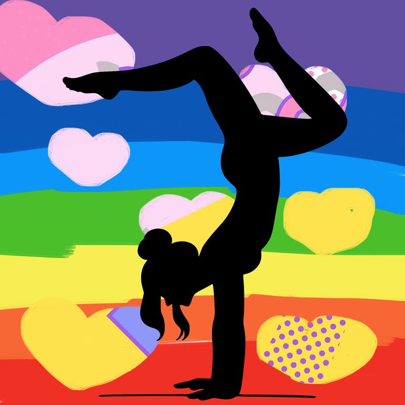 a woman doing a handstand