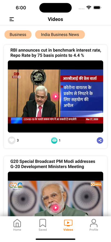 DDIndia - DD India app video feed showing business news and Prime Minister Modi addressing the G20.