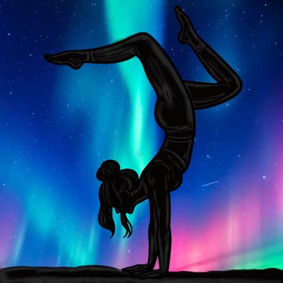 a woman doing a handstand