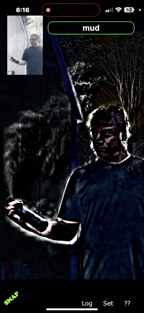 Ghost Camera by Pocket Future - Interface of the Ghost Camera app showing a man spraying mist and a ghostly face pattern appearing through a high contrast edge detection filter.