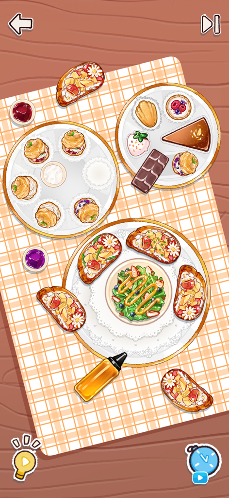 Satisroom: Perfectly Organized - Una vista cenital de un reconfortante juego de rompecabezas donde los jugadores organizan lindos pasteles y ensaladas sobre un mantel a cuadros