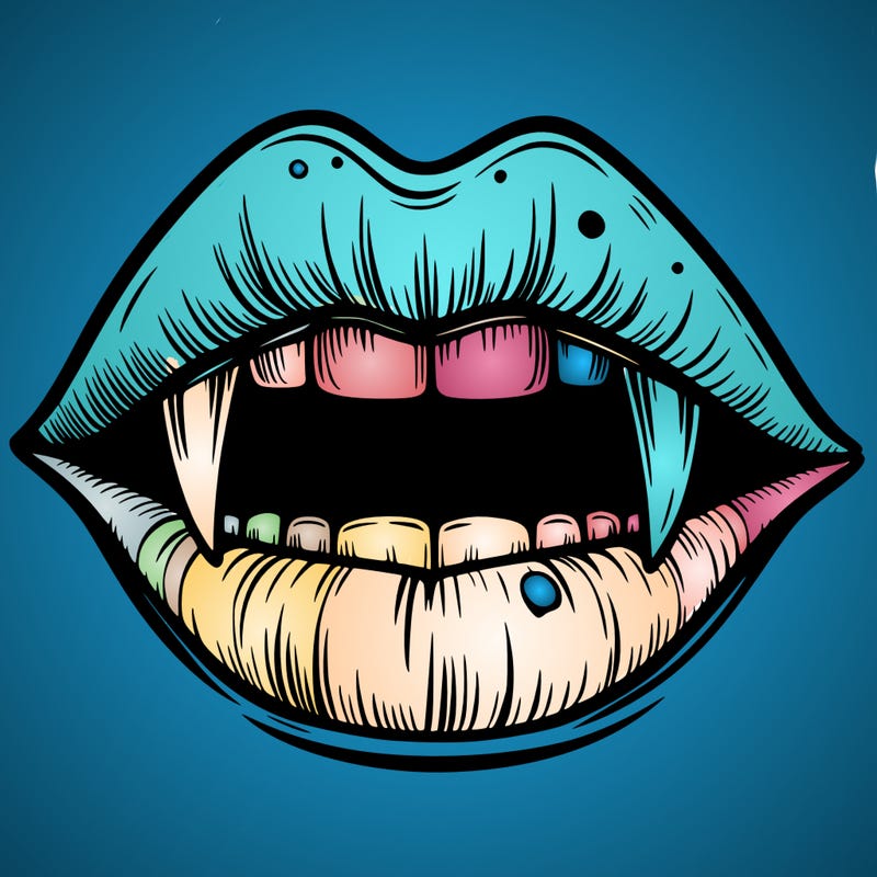 lips with vampire teeth
