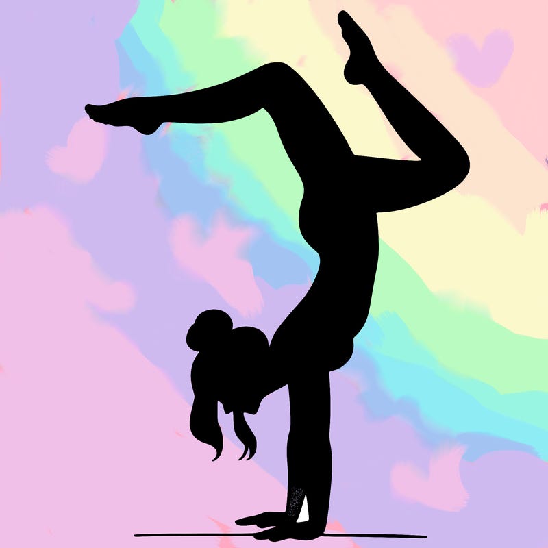 a woman doing a handstand