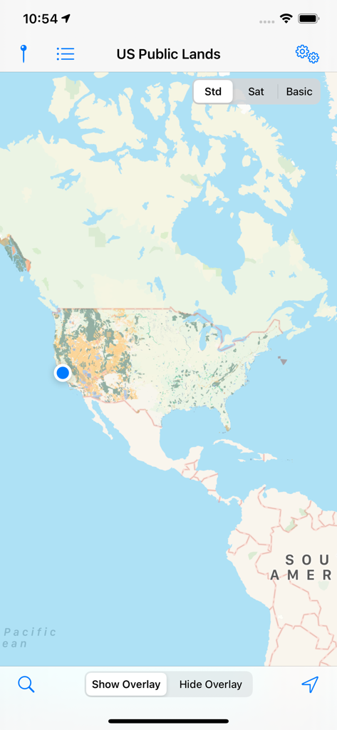 A map interface of the US Public Lands app showing color-coded federal land boundaries across the United States with a location marker.