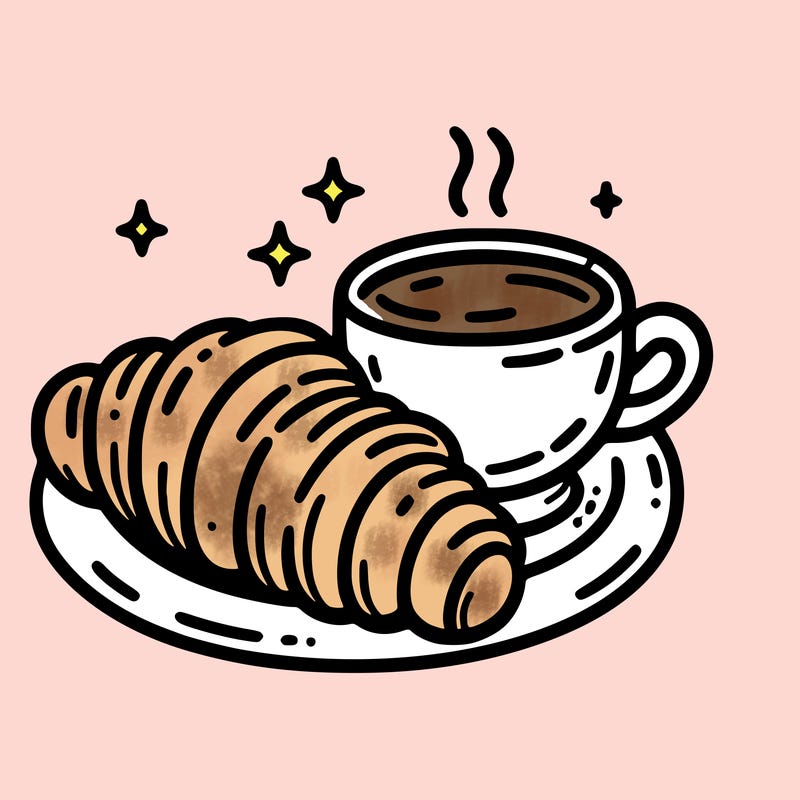 a croissant and a hot coffee placed on a plate