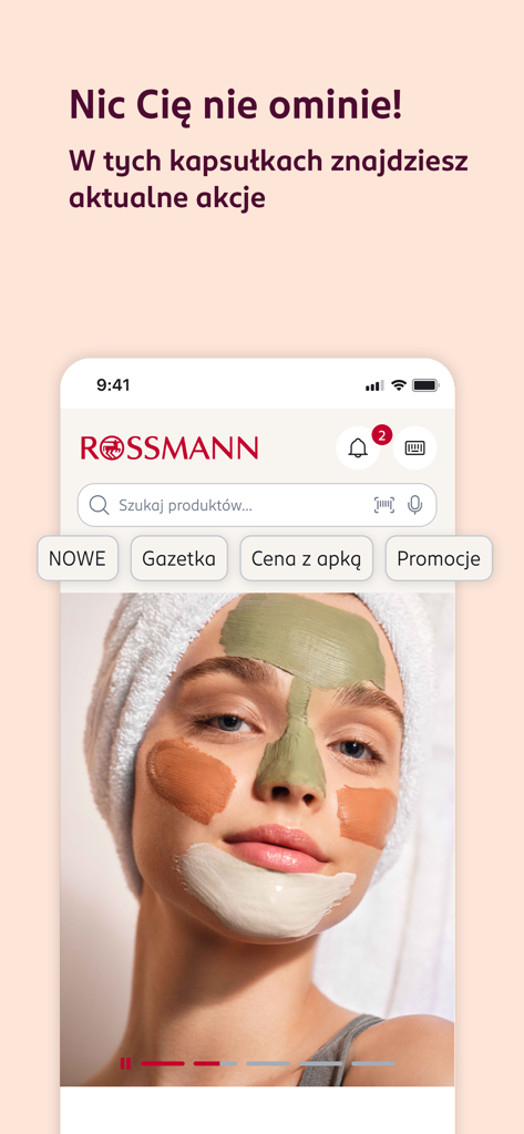 Pantalla de inicio de la app Rossmann PL mostrando promociones de belleza y una mujer con mascarillas.
