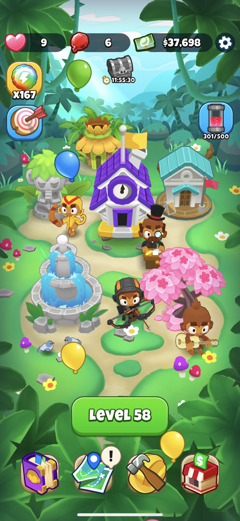 Bloons Pop! - Captura de pantalla del juego de Bloons Pop mostrando una escena decorada del Pueblo Mono con edificios y personajes monos animados