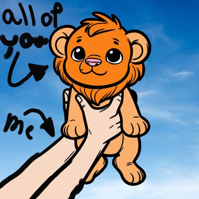 baby lion being held up