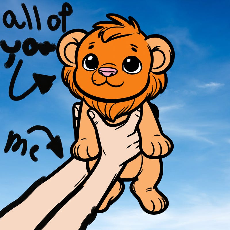 baby lion being held up