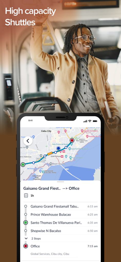 A professional employee riding a high capacity shuttle and using the MoveInSync app to track their office route and schedule.