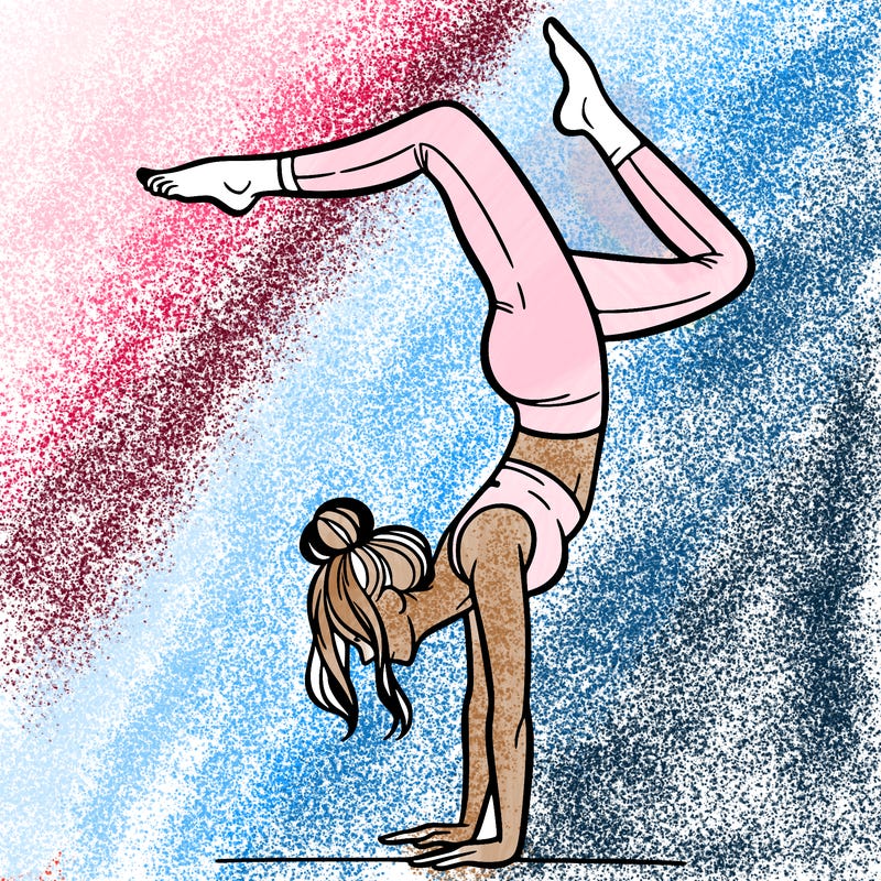 a woman doing a handstand