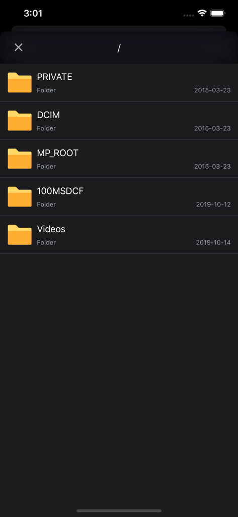 Interface of the FAir app showing the SD card file directory with folders like DCIM and Videos in dark mode.