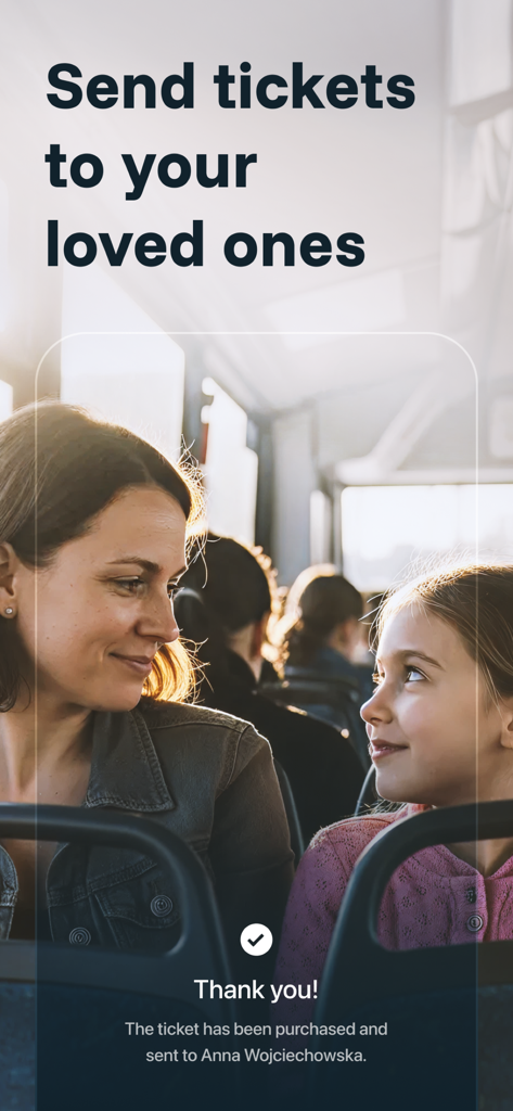 zBiletem - bilety komunikacji - Mother and daughter on a bus with a message confirming a shared transit ticket