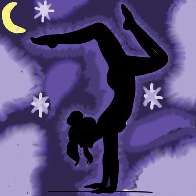 a woman doing a handstand