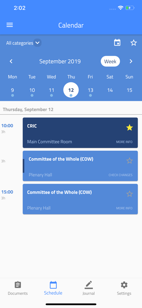 Pantalla de la aplicación móvil que muestra el horario de la conferencia con reuniones como CRIC y Comité Plenario