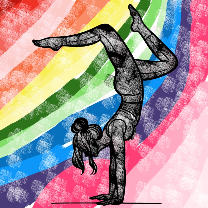 a woman doing a handstand