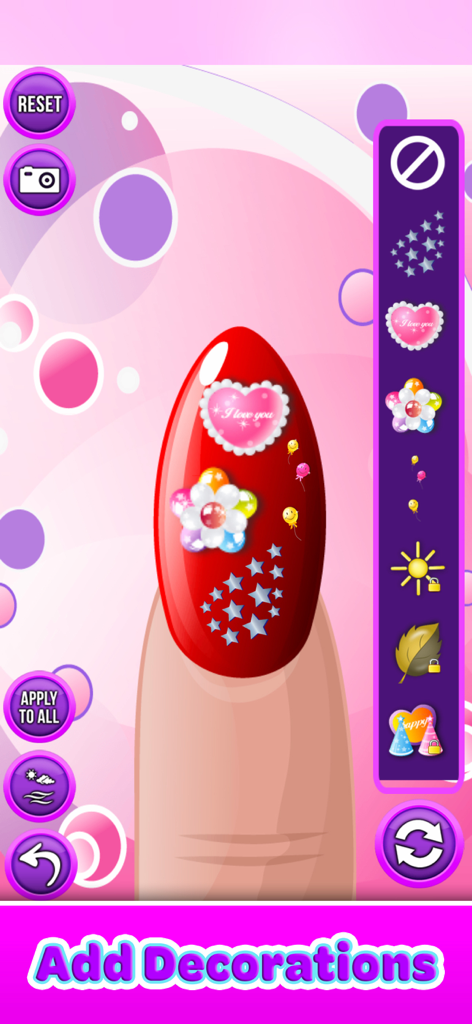 Nail Salon - Paint & Decorate - A red painted nail decorated with heart and star stickers in a nail salon simulation game
