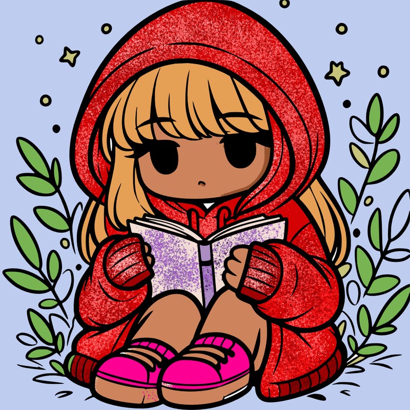 girl in oversized hoodie reading a book