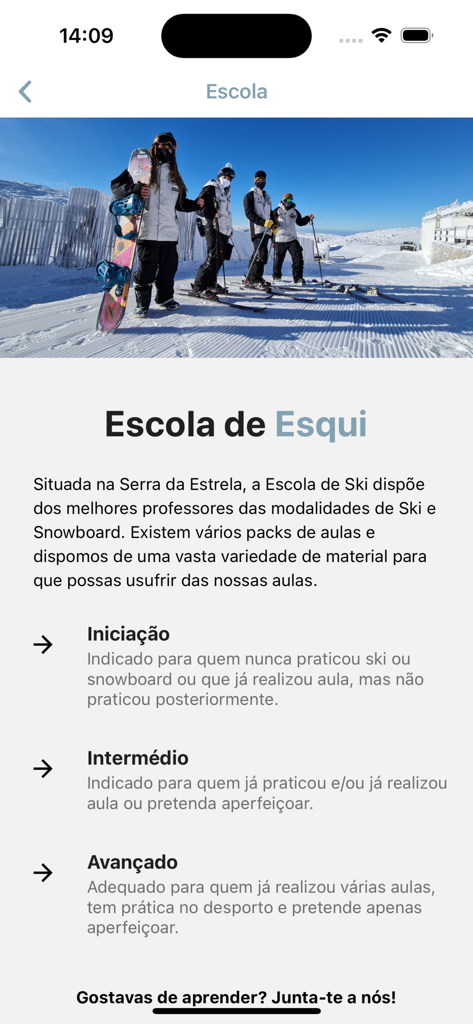 Écran d'informations sur l'école de ski montrant les niveaux de cours pour débutants, intermédiaires et avancés.