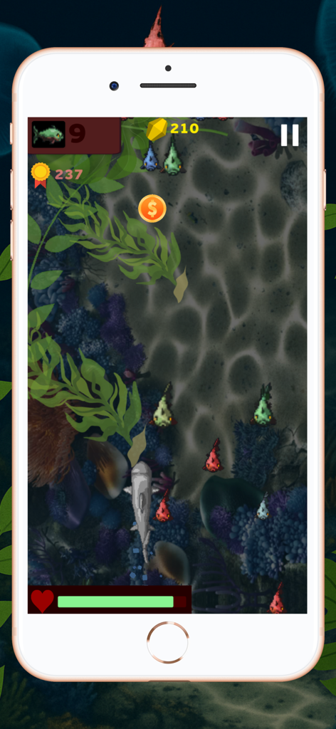 Top down gameplay of a shark hunting small fish and collecting coins in Shark World