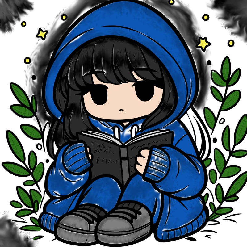 girl in oversized hoodie reading a book