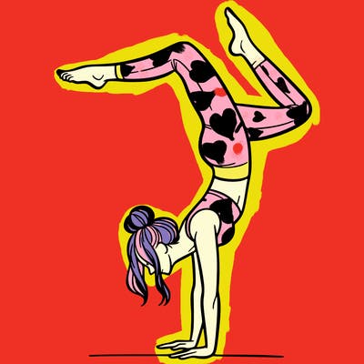 a woman doing a handstand