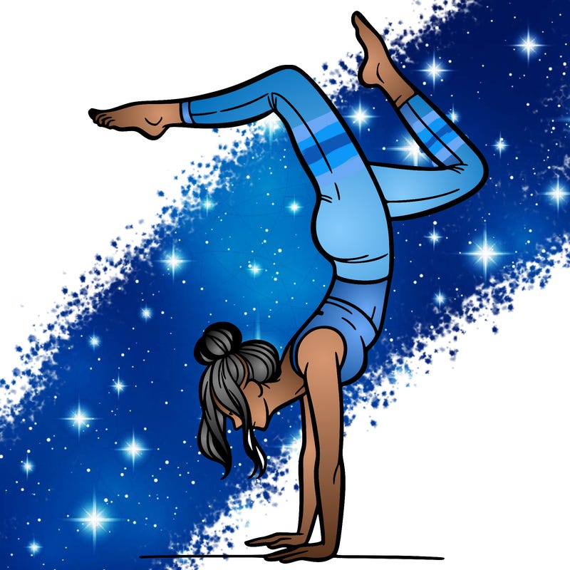 a woman doing a handstand