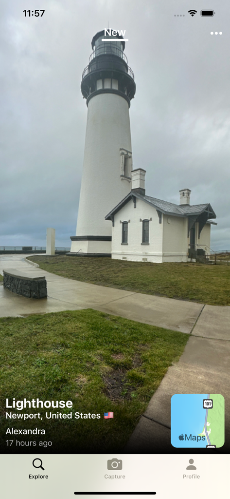 Panoramic view of a white lighthouse in Newport within the Teleport app explore feed.