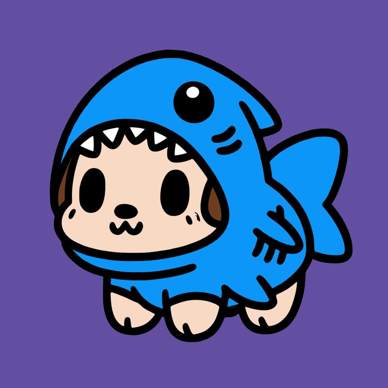 cute dog wearing a shark costume