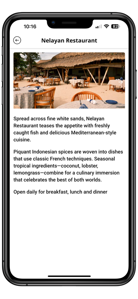 Belmond - ベルモンドアプリの画面。ネラヤン・レストランの説明と、そのビーチフロントダイニングエリアの写真を表示。