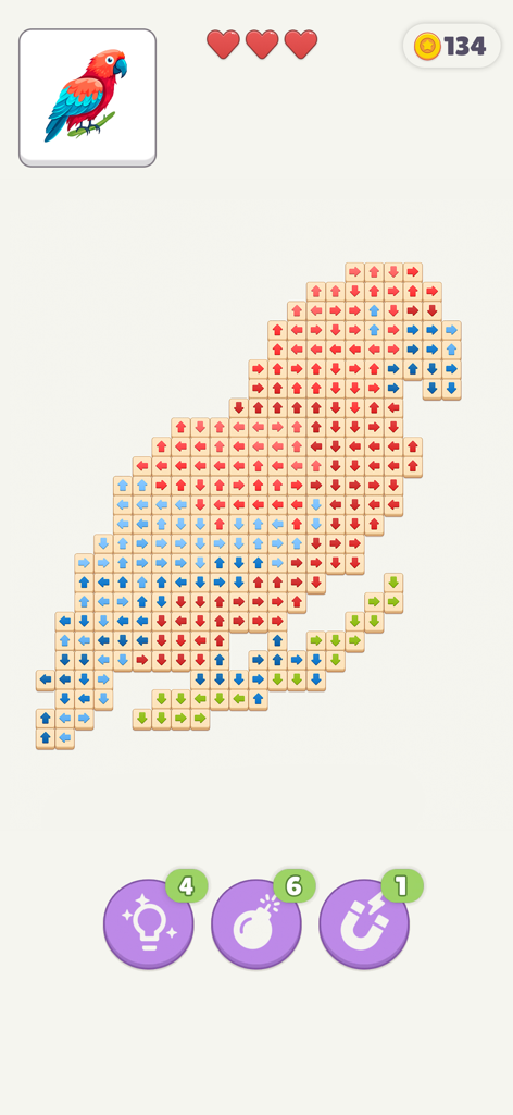 Un rompecabezas de bloques con forma de loro con flechas direccionales en el juego móvil Tap Gallery