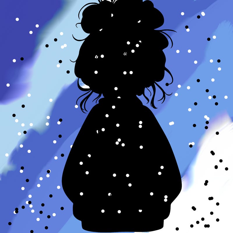 girl with baggy sweatshirt and messy bun