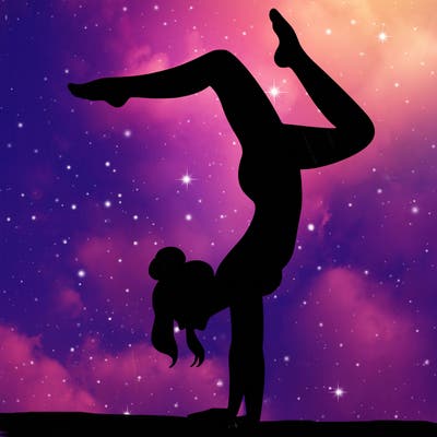 a woman doing a handstand