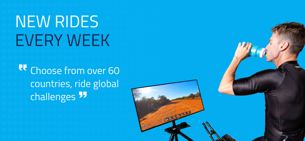 FulGaz Indoor Cycling App - A cyclist training indoors with the FulGaz app displaying a real world route on a screen