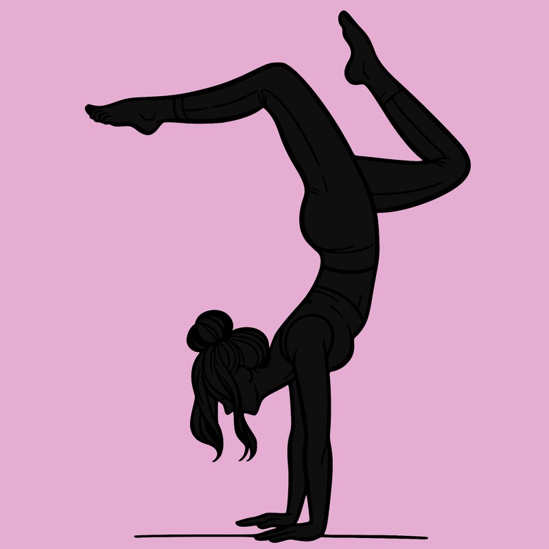 a woman doing a handstand