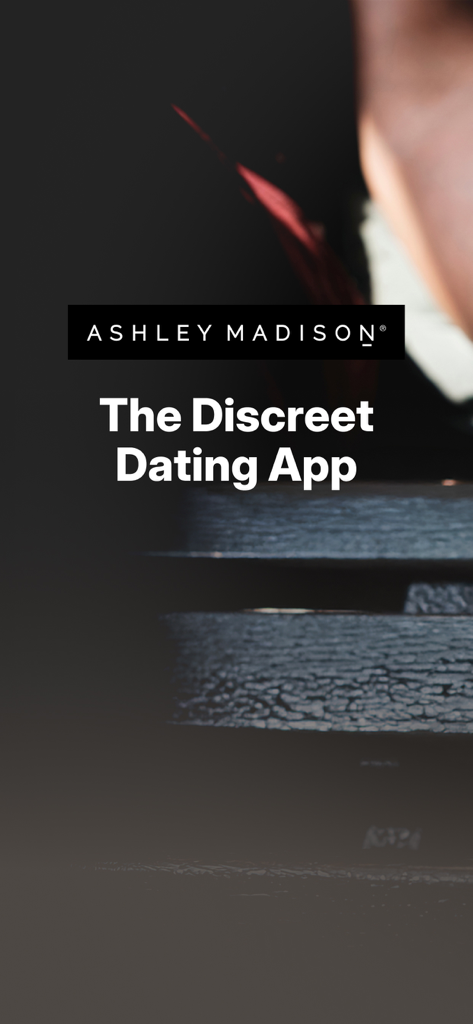 Logotipo de Ashley Madison y el lema The Discreet Dating App sobre un fondo oscuro