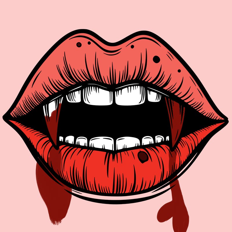 lips with vampire teeth