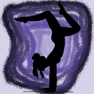 a woman doing a handstand