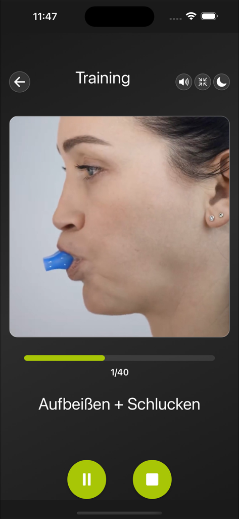 A woman performing a neurophysiological exercise with the FaceFormer device during a training session