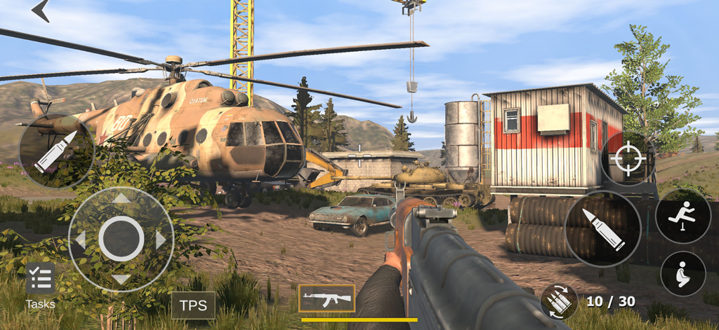Logan - FPS Game Creator - First-person shooter gameplay showing a custom 3D level with a helicopter and a tank