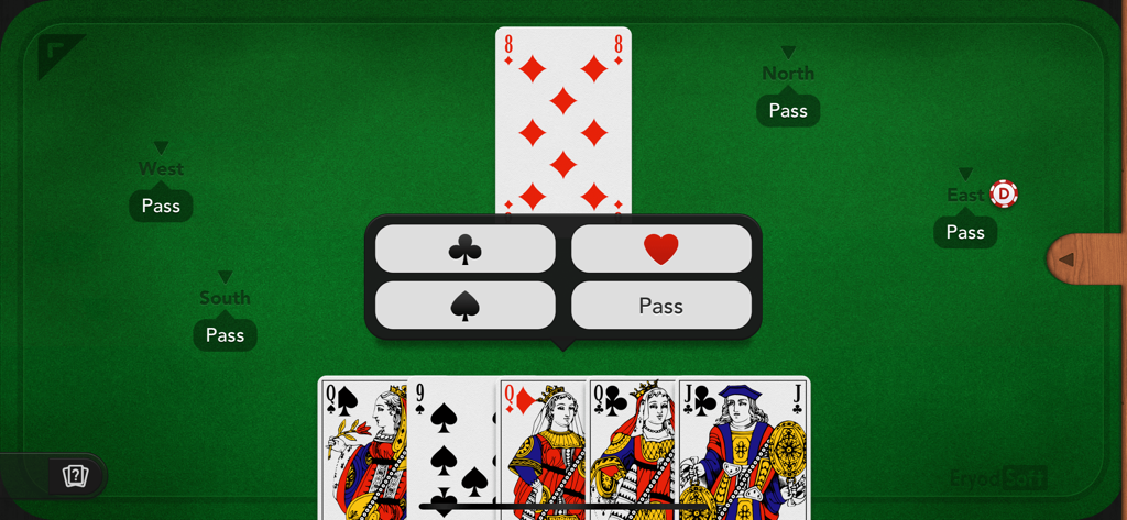 French Belote + - Bidding phase in French Belote plus card game with trump selection menu on a green felt table