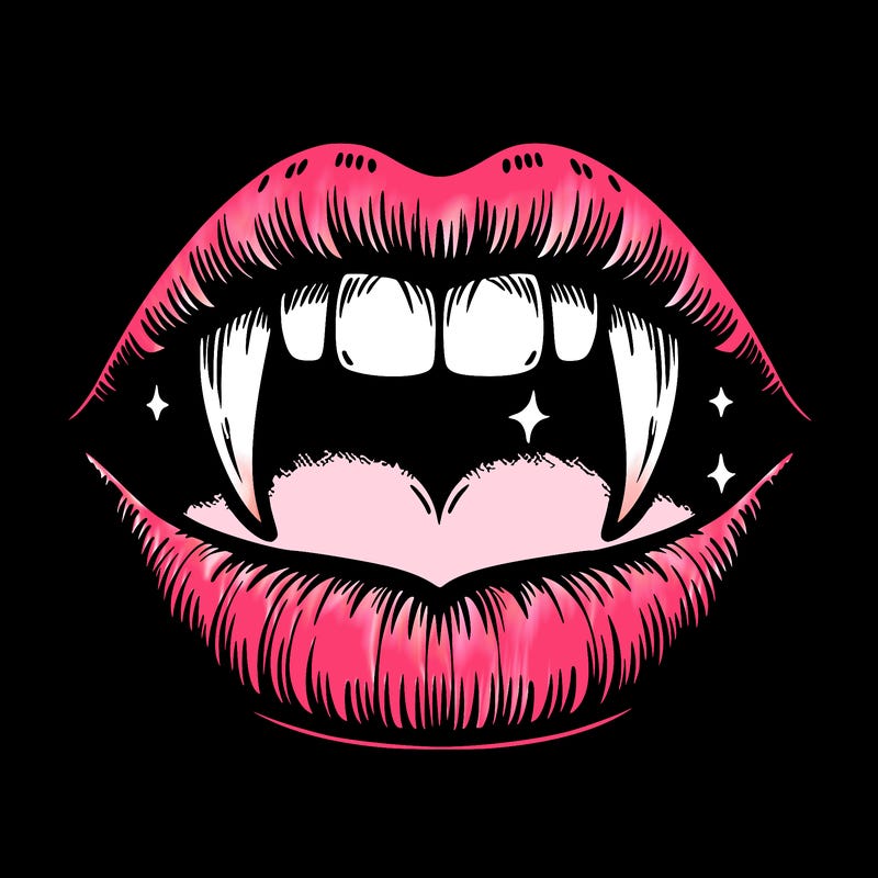 lips with vampire teeth