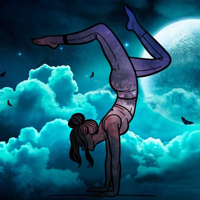 a woman doing a handstand