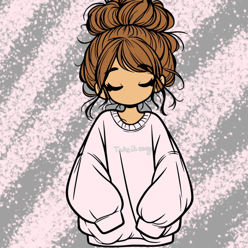 girl with baggy sweatshirt and messy bun