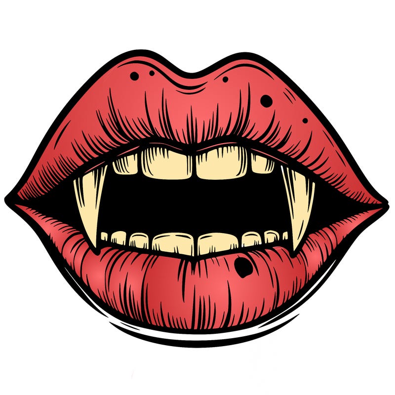 lips with vampire teeth