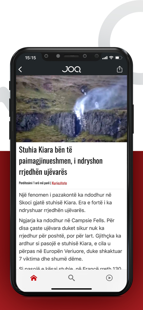 JOQ Albania - A news article within the JOQ Albania app describing the effects of Storm Kiara on a waterfall in Scotland.