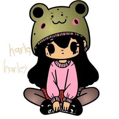 a girl wearing a frog hat and some frog socks